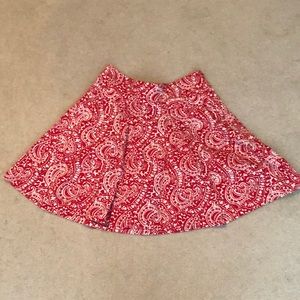 Red and white pleated skirt